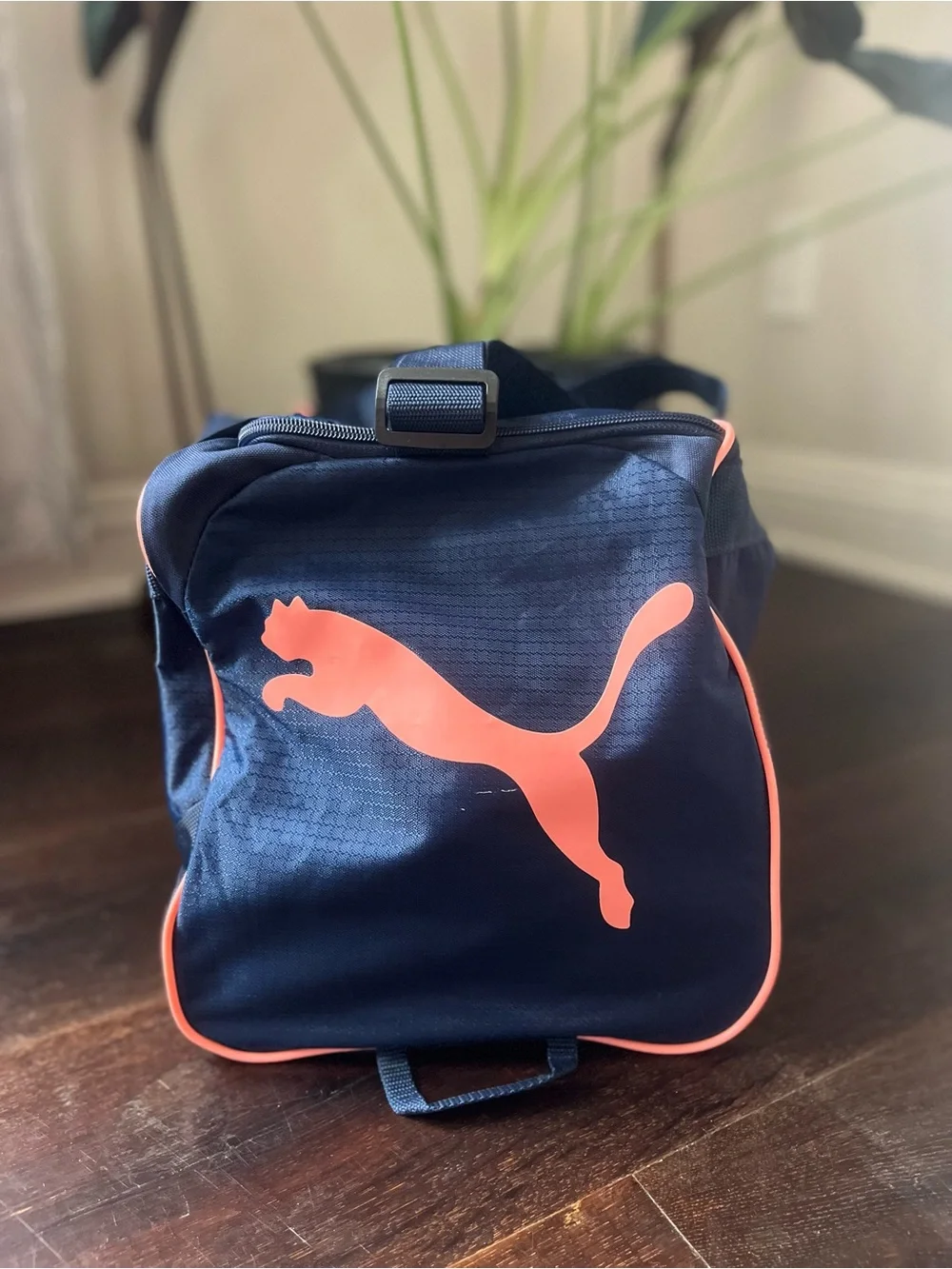 Puma Navy Duffel Bag with Coral Logo Accents